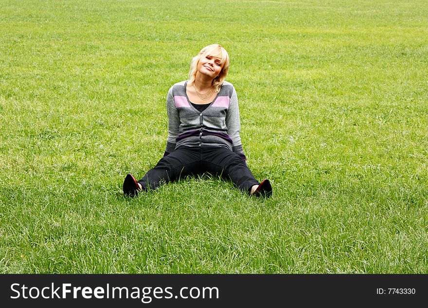 Girl on the green grass. Girl on the green grass