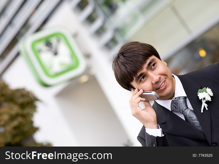 A man talking by phone