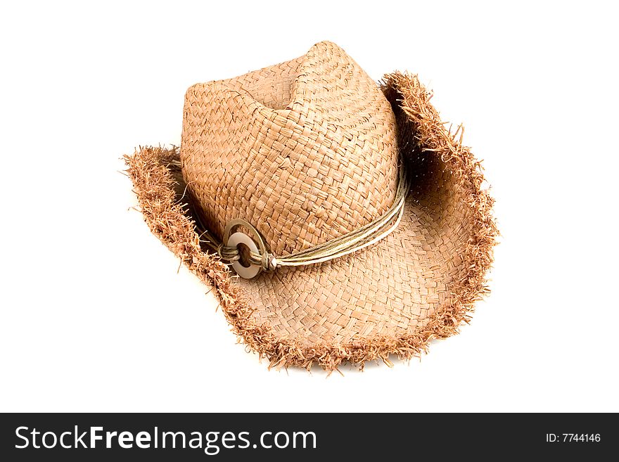 Straw hat on white ground