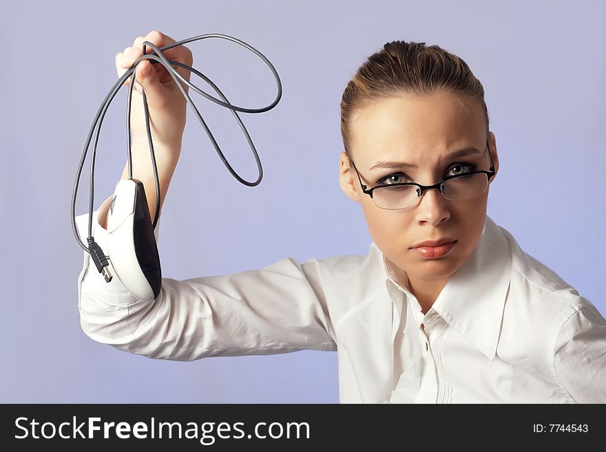 Businesswoman with computer mouse in a hand. Businesswoman with computer mouse in a hand