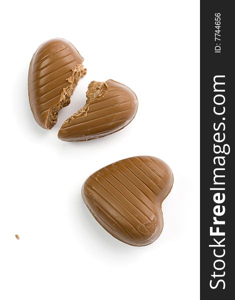 Two chocolate hearts, one broken heart. Two chocolate hearts, one broken heart