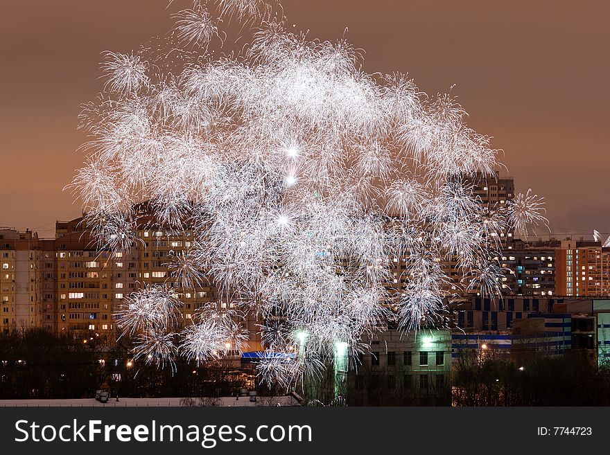 Fireworks over night city buildings. Fireworks over night city buildings