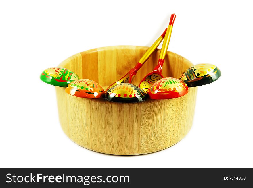 Russian wooden spoons on wooden bowl