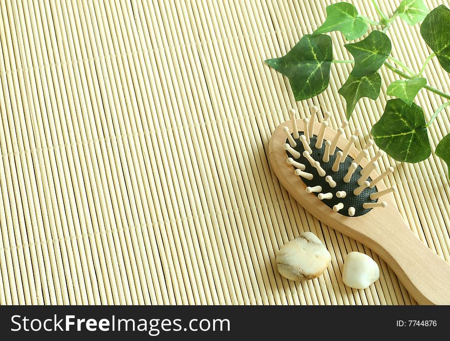 Spa background of brush and stones, closeup