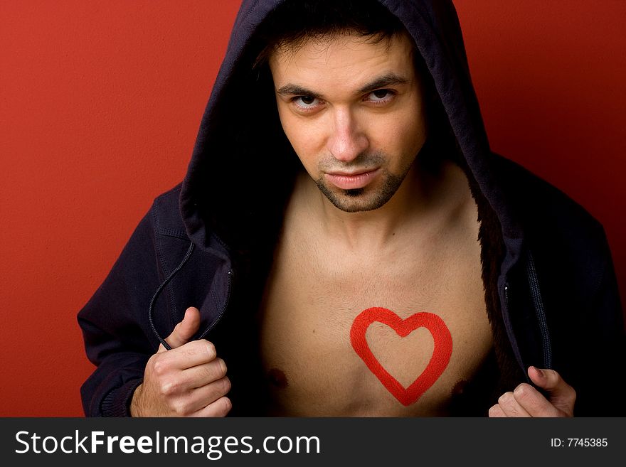 Portrait of Young Man with  heart painted