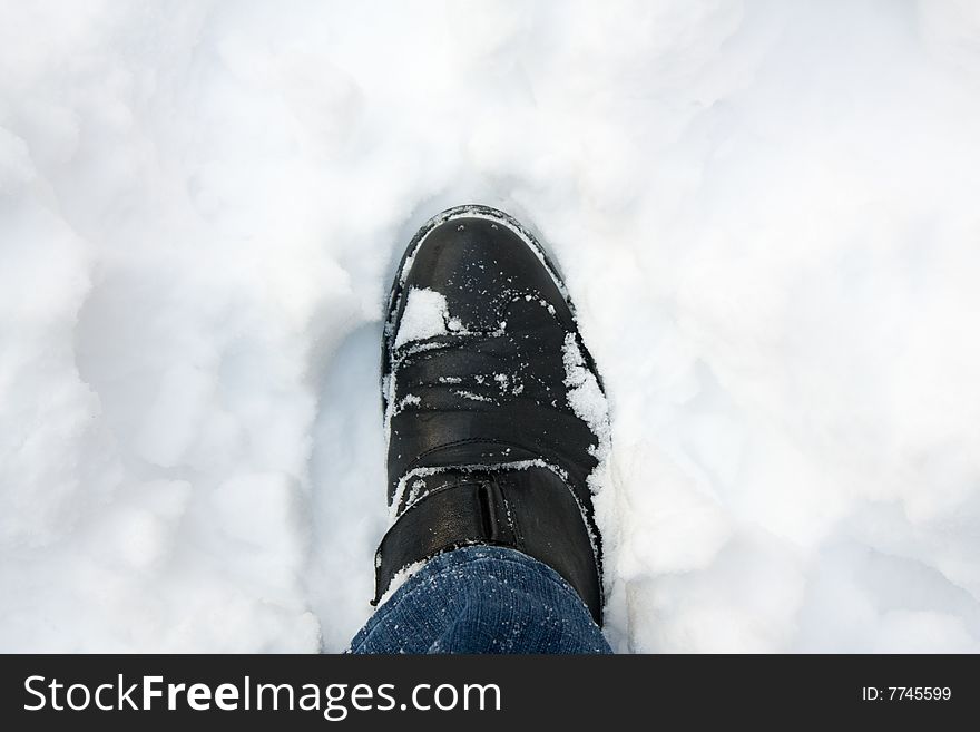 Shoot of boot in snow