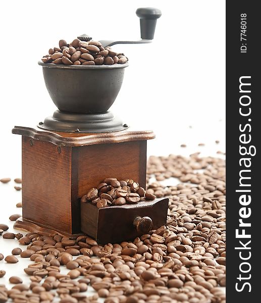 Coffee Grinder filled with Coffee Beans.