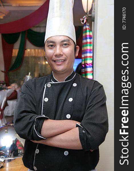 Chef standing in the restaurant while dinner time