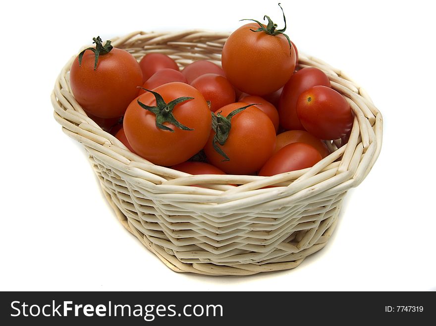 Some tomatoes in a basket