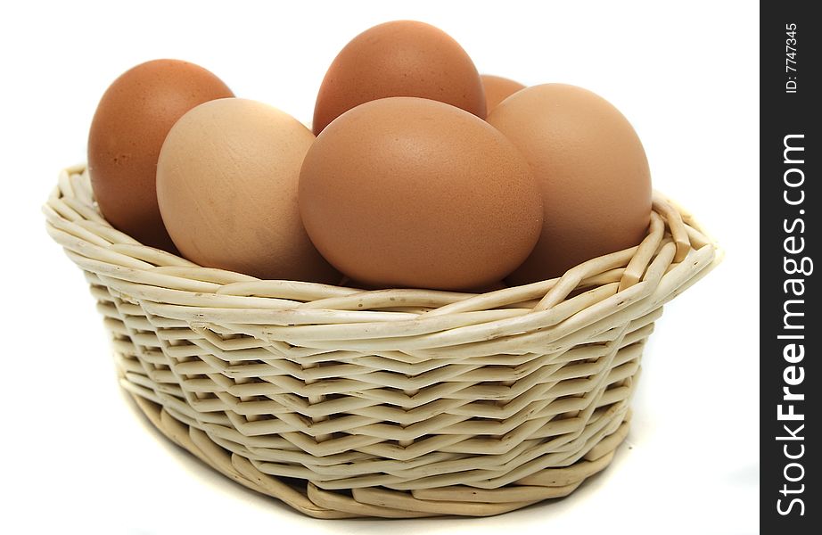 Some red eggs in a basket