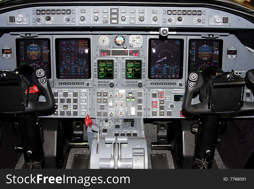 A view of a business jet flight deck showing instruments. A view of a business jet flight deck showing instruments
