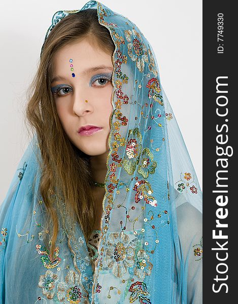 Closeup of fashion girl showing blue scarf. Closeup of fashion girl showing blue scarf