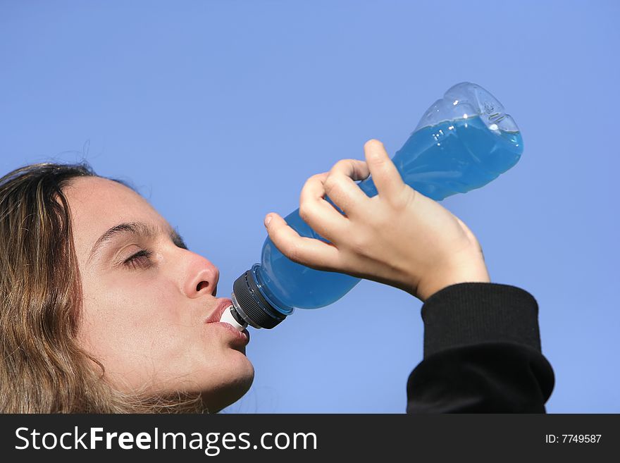 Girl drinking an energetic drink