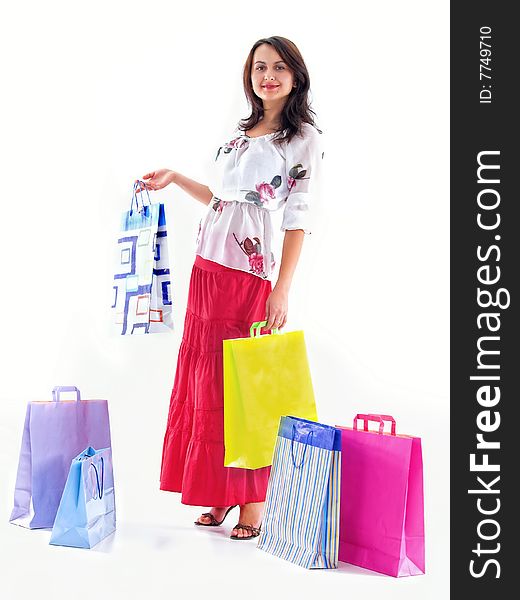 Shopping girl whit diverse bags,isolated on white background. Shopping girl whit diverse bags,isolated on white background