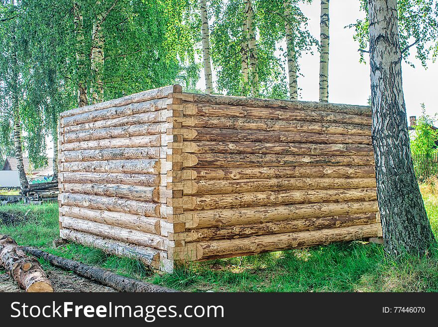 Construction of a new wooden house, log cabin on summer. Construction of a new wooden house, log cabin on summer