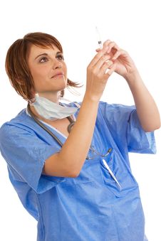 Female Doctor Inspecting Filled Syringe Stock Images Female Doctor Inspecting Filled Syringe Stock Images