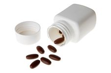 Medicine Pills With A White Bottle Stock Photography