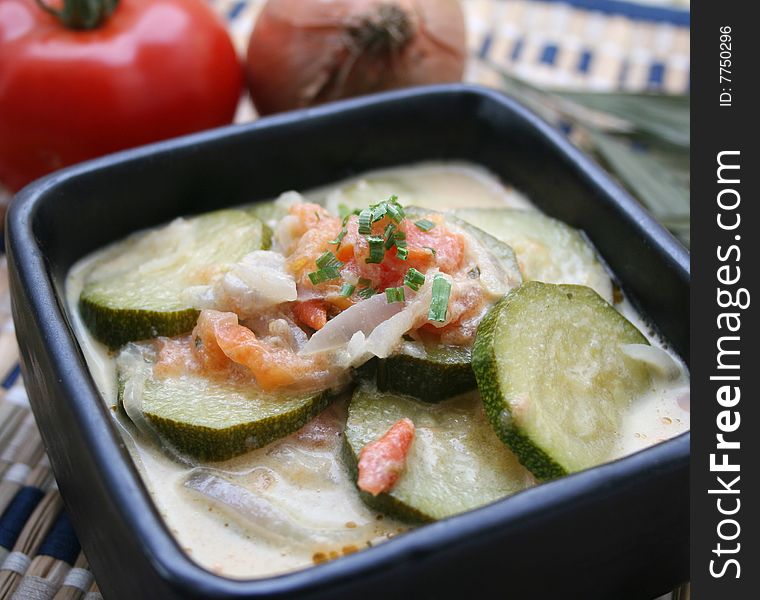 A stew of fresh zucchini with tomatoes