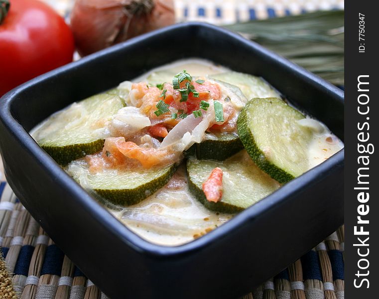 A stew of fresh zucchini with tomatoes