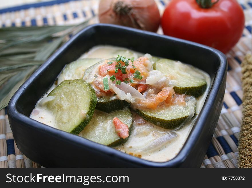 A stew of fresh zucchini with tomatoes