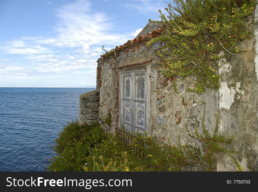 Deserted house on the sea in Cefalï¿½, Sicily