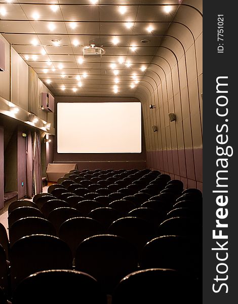 Empty small cinema auditorium with chairs