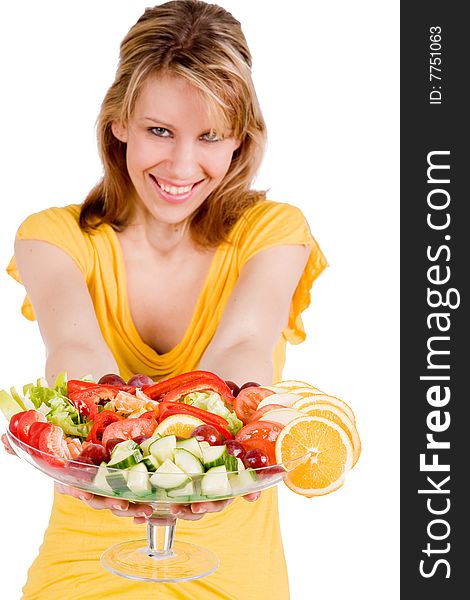 Young girl is presenting a delicous salad. Young girl is presenting a delicous salad