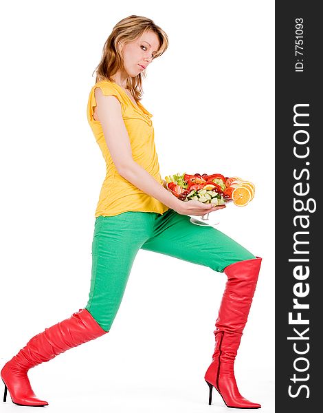 Young girl is posing with a delicious salad. Young girl is posing with a delicious salad