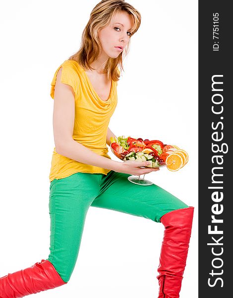 Young girl is posing with a delicious salad. Young girl is posing with a delicious salad