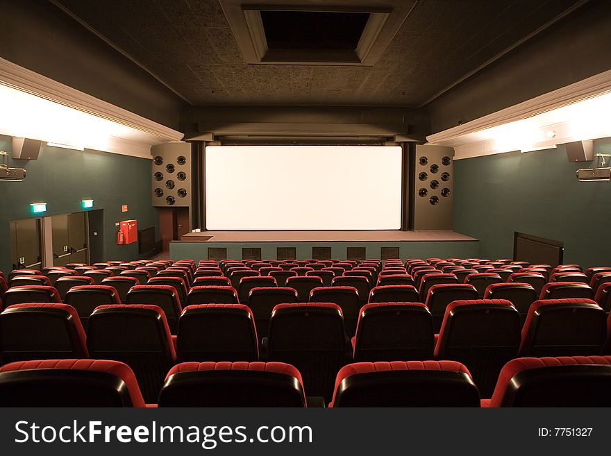 Empty small cinema auditorium with chairs