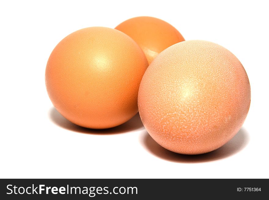 Three eggs isolated on white.