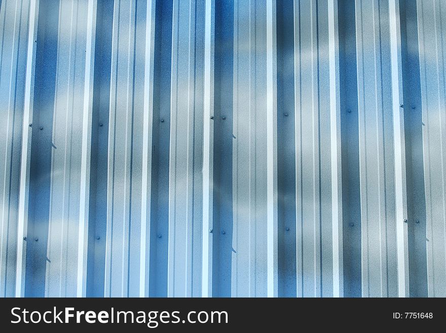 A corrugated metal wall background