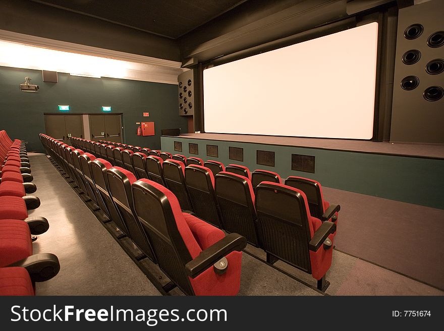 Empty small cinema auditorium with chairs