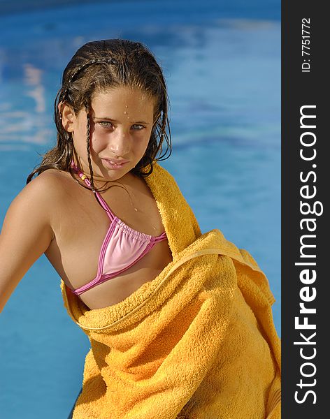 Beautiful girl with green eyes, posing in a pool. Beautiful girl with green eyes, posing in a pool