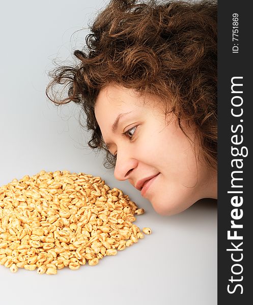 Ppopped wheat grains and beautiful girl. Ppopped wheat grains and beautiful girl