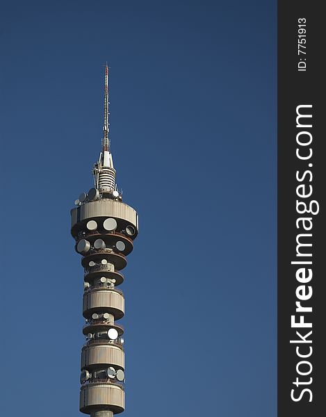 Communication antenna tower in blue sky