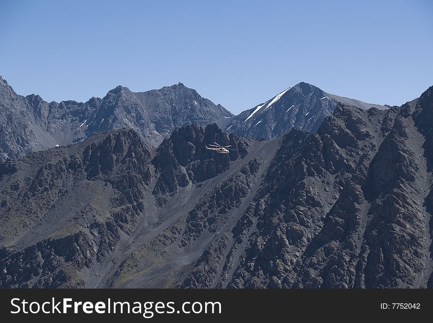 Helicopter In The Mountains