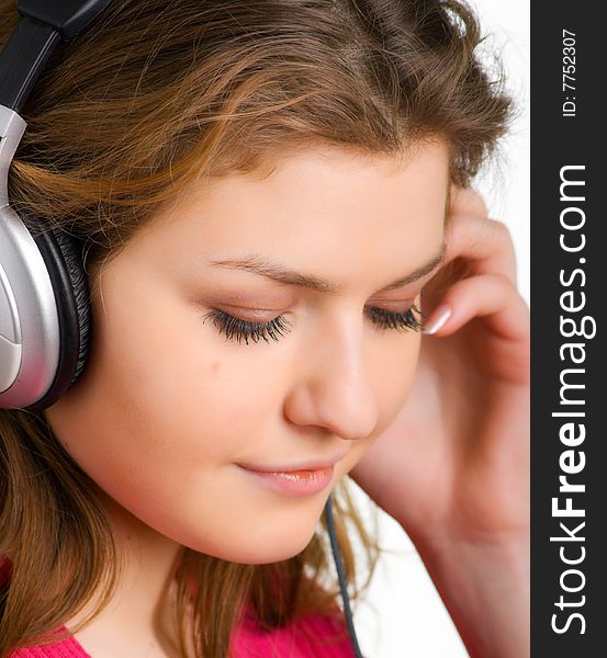 Listens to music