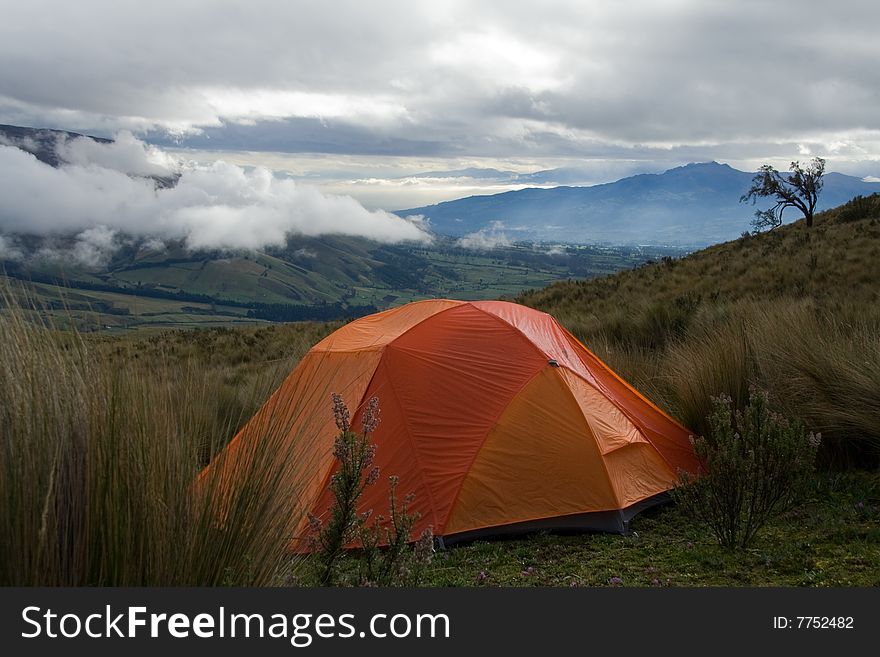 Orange tent in a wide wild landscape. Orange tent in a wide wild landscape