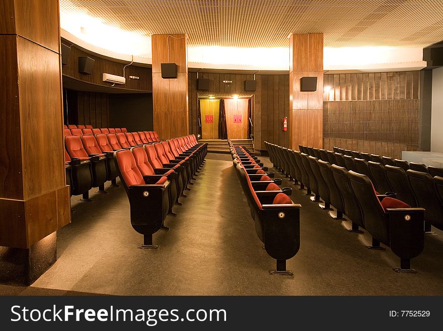 Empty small cinema auditorium with chairs