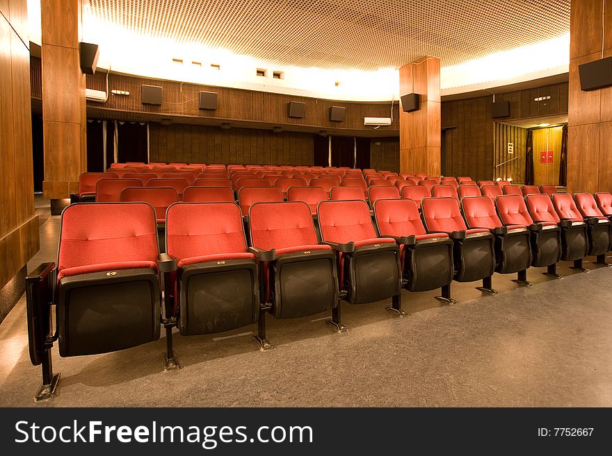 Empty small cinema auditorium with chairs