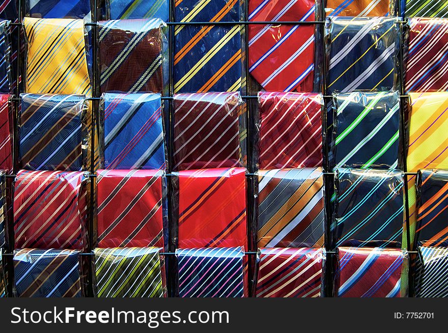 Rows of colored neckties are displayed in the market of San Lorenzo,Florence