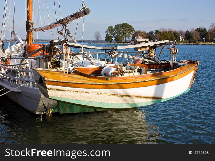 Sailboat With Classic Wooden Dingy.