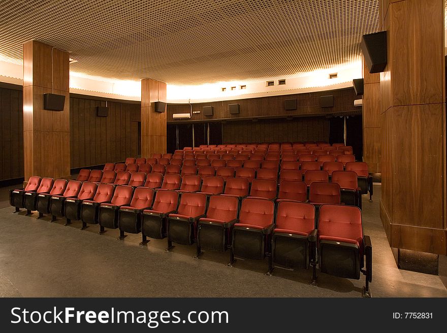 Empty small cinema auditorium with chairs