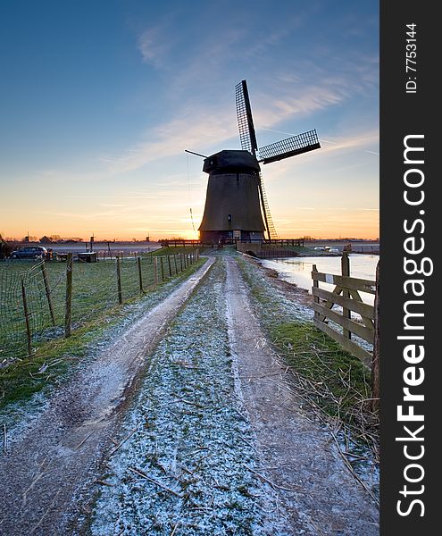 Beautiful windmill winter landscape in holland