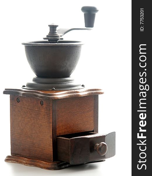 Coffee Grinder filled with Coffee Beans. Back lite..