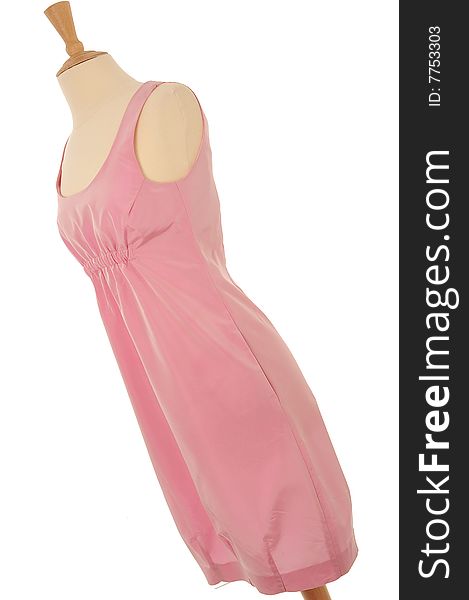 Contemporary pink evening dress on a Mannequin as it would displayed in a shop. Contemporary pink evening dress on a Mannequin as it would displayed in a shop