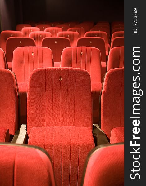 Empty small cinema auditorium with chairs