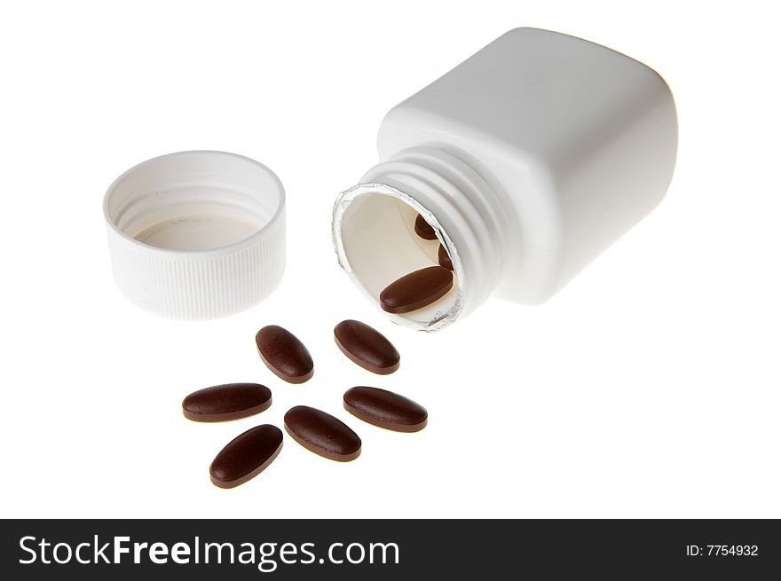 Medicine pills with a white bottle on white background.