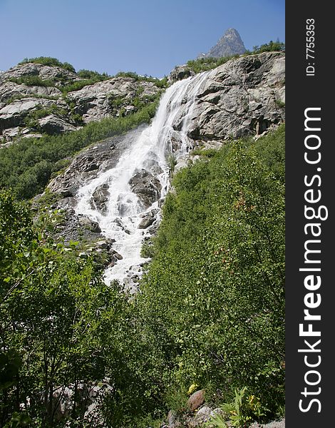 Waterfall in spring season, Caucasus mountains